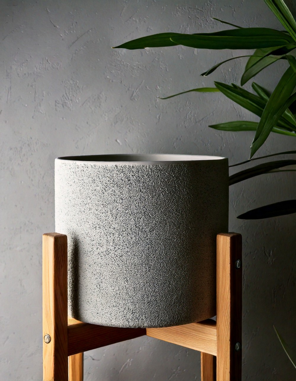 Grey cement planter with wooden stand