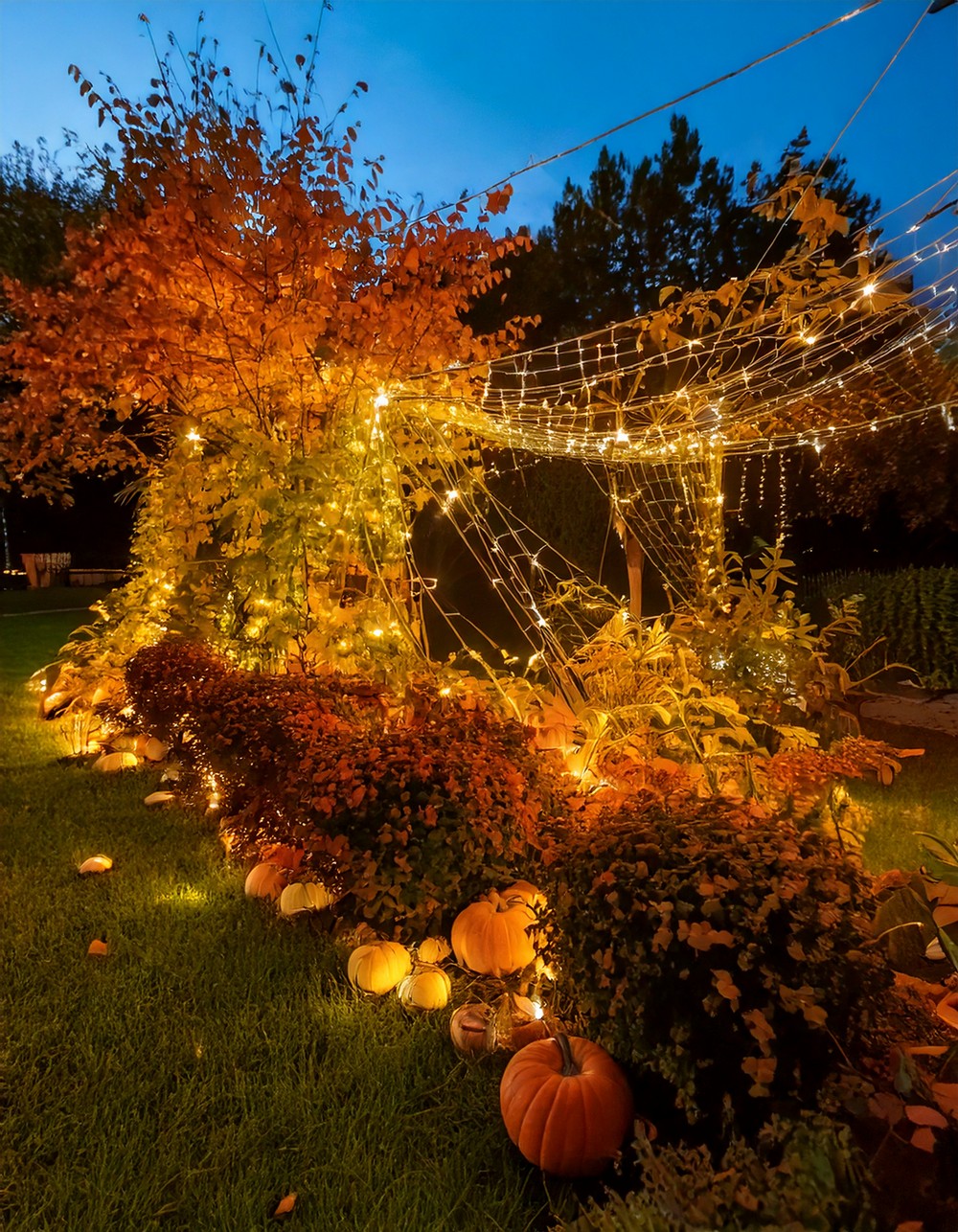 Drape Net Lights Over Bushes with Fall Decor