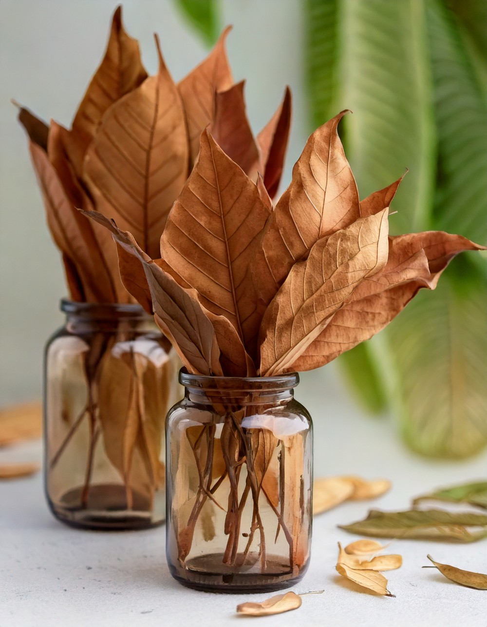 Incorporate Dried Leaves in Small Vases