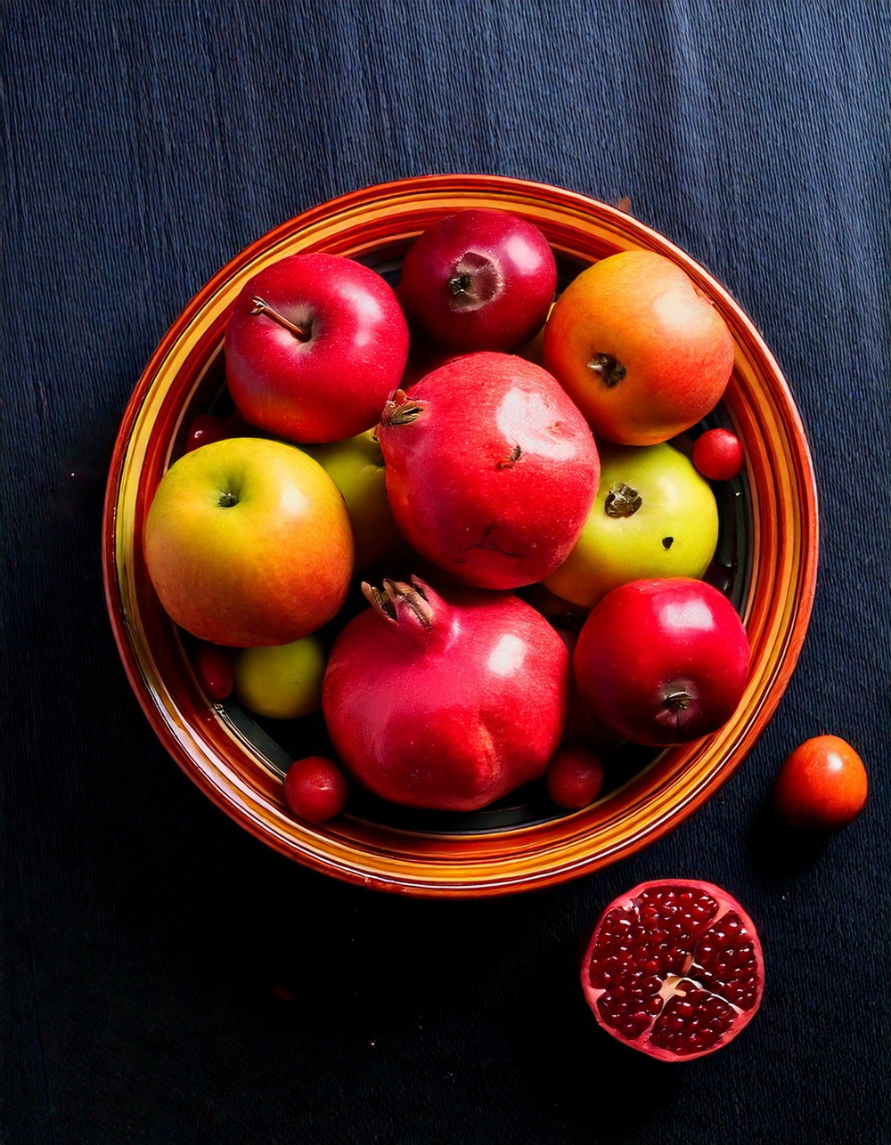Vibrant Fruit Bowl with Apples and Pomegranates