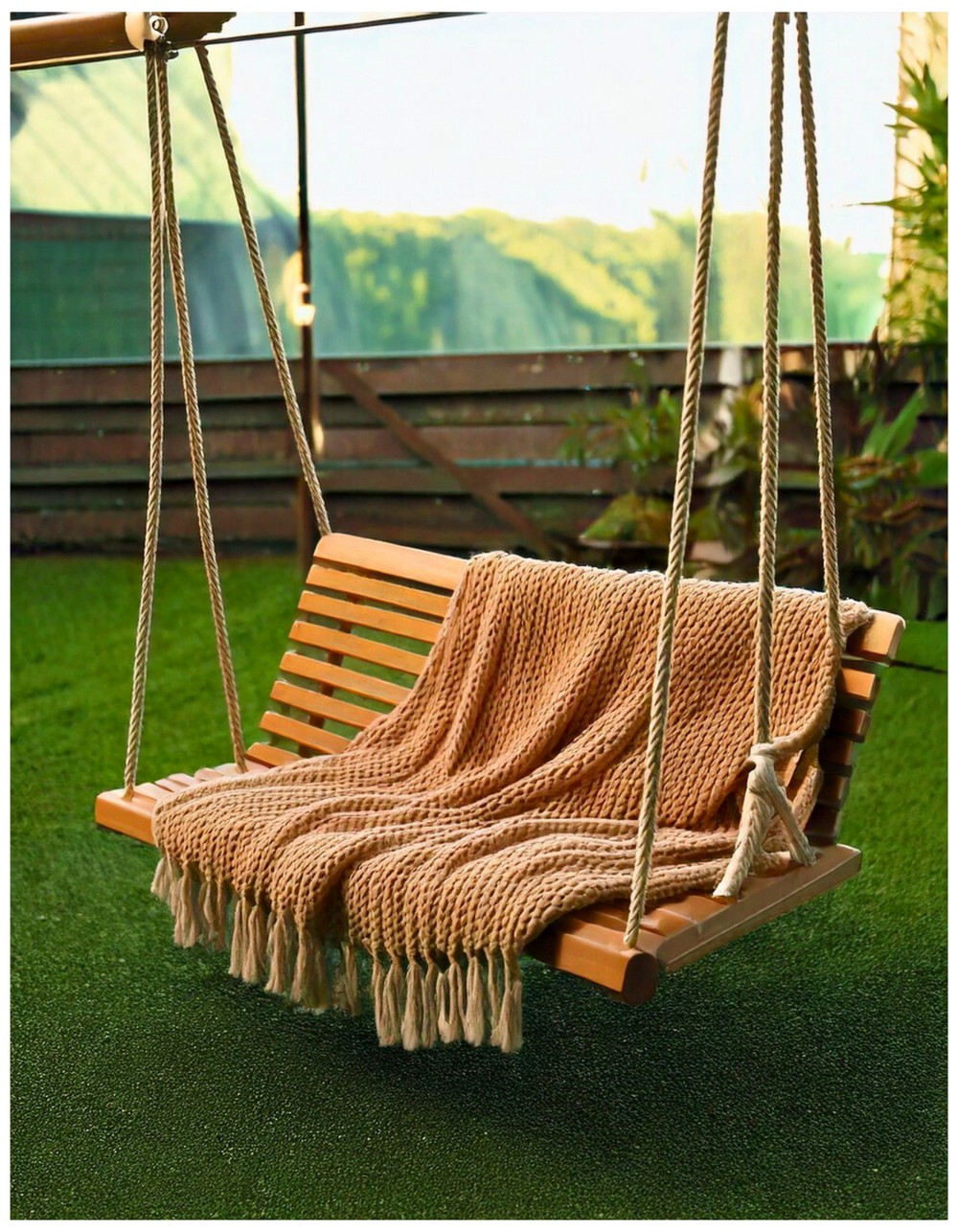 Swing Bench Draped with a Knit Blanket